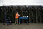 Chief Operating Officer Monty Stahl shows off the servers at the Merkle Standard cryptocurrency mining facility in Usk, Wash. on Friday, Sept. 9, 2022 (Erick Doxey for InvestigateWest)