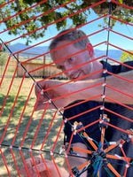 OSU engineering professor Chet Udell plays the SpiderHarp at Emerson Vineyards in August 2022 in Monmouth.