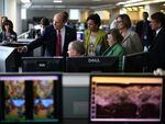 NOAA's National Weather Service Director Louis Uccellini (L), gives a tour of NOAA's Center for Weather and Climate Prediction, to Commerce Secretary Penny Pritzker (2ndL), Sen. Barbara Mikulski (D-MD) (3rd-R), NOAA Acting Administrator Kathryn Sullivan (2nd-R), and Bryan Norcross (R),of the Weather Channel, , July 2, 2013 in Riverdale, Maryland.