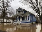 Many houses in Waitsburg, Washington, a small wheat town, are still sitting in lakes of trapped water. Residents were busy moving out their valuables, and accessing damage on Saturday, Feb. 8, 2020.