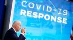 Pres. Biden speaks in front of a screen that says "COVID-19 Response."