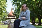 Veterinarian Dr. Katy Felton and her 12-year-old greyhound Beatrice Fern sit at Dawson’s Park in Portland, a usual walking trail for the two.