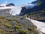 Researchers for the Nooksack Tribe document the flow of Sholes Creek from the Sholes Glacier on Mount Baker.