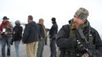 An armed man with a group called the Pacific Patriots Network. The network arrived in Harney County Saturday, Jan. 9, claiming to secure the scene of the occupation at the Malheur National Wildlife Refuge.