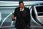 Will Smith cries as he accepts the award for best performance by an actor in a leading role for "King Richard" at the Oscars on Sunday, March 27, 2022, at the Dolby Theatre in Los Angeles.
