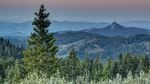 This view from the Pacific Crest Trail in the Cascade-Siskiyou National Monument includes the sun, moon, Mount Shasta and Pilot Rock.