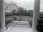 This photograph shows the construction of the platform for the gazebo where Tricia Nixon and Edward Cox would exchange vows in the Rose Garden.