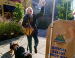 Perrin Thompson kisses her ballot for luck and does a little dance before dropping it into a drop site outside of the Multnomah County Elections Division in Portland, Ore., Nov. 8, 2022. Full story here.