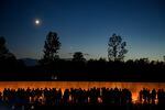 Visitors line the Wall of Names at the National Flight 93 Friday Memorial in Shanksville, Pennsylvania.  The Luminaria ceremony commemorates the 40 victims of Flight 93.