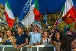 Supporters of Giorgia Meloni and the Fratelli d'Italia political party at a campaign event in Turin on Sept. 13.