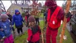 Bailey Schacher leads a team of neighborhood volunteers in a Friends of Trees planting.