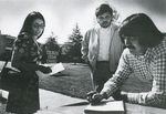 (From left) Jan Chavez, Sonny Montes and Jose Romero in front of Colegio César Chávez in 1973.