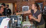 Bartender Jordan Lewis mixes drinks on June 8, 2022, at J-DUB Bar in Bend. Her workplace, like others, has struggled to find enough employees to meet the summer demand.
