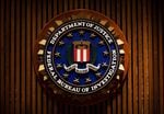 A seal of the FBI reads "Department of Justice Federal Bureau of Investigation"