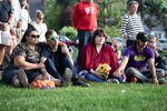 Caroline Beech and neighbors from the Fox Hollow apartments attend a community vigil at Drake Park in Bend, Ore., Monday, Aug. 29, 2022, following an attack on the Forum Shopping Center. The gunman also lived at the Fox Hollow apartments behind the shopping center.