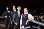Members of The Slants pose for a photo. From left to right, guitarist Joe X. Xiang, vocalist Ken Shima, bass and bandleader Simon Tam, and drummer Yuya Matsuda.