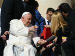 Pope Francis blesses a guest on March 29, 2023 during the weekly general audience at St. Peter's square in The Vatican.