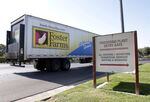 In this file photo, a truck enters the Foster Farms processing plant, in Livingston, Calif., Oct. 10, 2013. (AP Photo/Rich Pedroncelli)