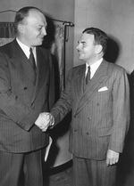 Harold Stassen, former Minnesota Governor, left, and New York Gov. Thomas E. Dewey shake hands before the Oregon Republican Presidential Primary debate at KEX-ABC radio station in Portland, Ore., May 17, 1948.