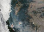 NASA's Aqua satellite captured the image of southwestern Oregon wildfires and smoke blowing from them on Aug. 6, 2018, with the Moderate Resolution Imaging Spectroradiometer, MODIS, instrument.