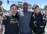 (Left to right) Jon Bair, Mic Crenshaw, and Micah Fletcher at George Floyd Square in Minneapolis, Minn., in May 2021, a year after Floyd's murder.