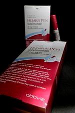 FILE - This July 18, 2014, file photo shows AbbVie's signature drug Humira, in Houston. Humira is one of the most commonly prescribed specialty medications used to treat autoimmune disorders.
