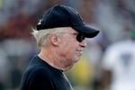 FILE - Nike chairman Phil Knight stands on the sideline prior to an NCAA college football game between Oregon and Arizona State in November 2019, in Tempe, Ariz. Oregon’s richest man has so far reported spending $2 million on electing Republicans to the Oregon House and Senate this fall.