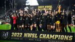 Portland Thorns FC celebrates with the trophy after the won the NWSL championship soccer match against the Kansas City Current, Saturday, Oct. 29, 2022, in Washington, DC.