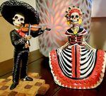 Sara Padilla of West Linn’s Day of the Dead altar, shown in this 2021 file photo, includes figurines, and memorials for family members and a cherished pet. Chemeketa Community College in Salem will be host to live performances and a traditional Día de Muertos altar on Wednesday, Nov. 2, 2022.