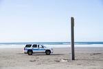 Gearhart Police Chief Jeff Bowman sits in his patrol car on the beach on Feb. 9, 2021 in Gearhart, Oregon.