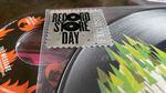 Two 45 rpm vinyl picture discs, with silver "Record Store Day Exclusive" stickers