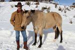 Tom Sharp with his horse, "Buck" at his ranch outside of Burns.