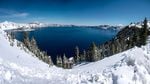 Snow blankets Crater Lake National Park in this April 15, 2015, file photo.