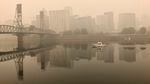 A view of downtown Portland from the East Bank Esplanade is seen on Monday, Sept. 14, 2020. The entire Portland metropolitan region remains under a thick blanket of smog from wildfires that are burning around the state and residents are being advised to remain indoors due to hazardous air quality.