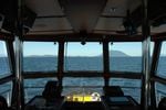 The view from the wheelhouse of the Pacific Titan tugboat along the Inside Passage to Alaska.