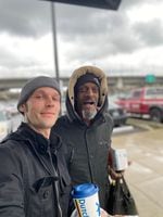 Caleb Ruecker with his friend Leroy Sly Scott, a homeless Portlander who died in 2020. For years Scott could be found in the Sunnyside neighborhood.  A new Portland Street Art Alliance mural commemorates his life.