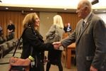 Vancouver City Councilor Bill Turlay congratulates Laurie Lebowsky, who was appointed to the city council at a special meeting on Monday Feb. 5.