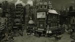 A stop motion animated scene of a cityscape in black, white and grey. It's a city square surrounded by dark towering buildings against a cloudy sky, with signs written in Japanese. A billboard has a picture of a man wearing a gas mask.