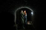 March 25: Maria Rushchyshyn and Maria Pysco (L-R) take shelter in an air-raid shelter after air raid sirens sounded in Lviv, Ukraine.