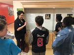 Lisa Jarrett and students engage in the Dr. Martin Luther King School Museum of Contemporary Art project.