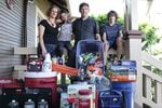 The Stephens, an Oregon family, outside their North Portland home with their emergency preparedness kit.