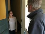 Ted Wheeler introduces himself to a voter in Southeast Portland.