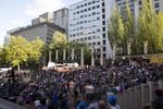 An estimated 2,000 people filled Pioneer Courthouse Square throughout the evening for Low Bar Chorale's Purple Rain sing.