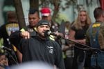 A 2017 file photo of Patriot Prayer leader Joey Gibson addressing a crowd at a rally and holding a moment of silence for the victims of the Portland MAX train stabbings.
