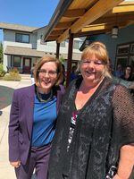 Char Reavis (right) with former Oregon Gov. Kate Brown at a Residents Organizing for Change event. ROC regularly meets with local, state and federal housing stakeholders.