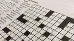 A black and white crossword grid.