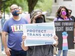 Protesters rally at the Texas State Capitol on May 4, 2021 in Austin to stop proposed medical care ban legislation that would criminalize gender-affirming care.