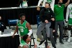 North Texas head coach Grant McCasland jumps in celebration as Thomas Bell (13) looks over his left shoulder.