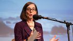 Oregon Gov. Kate Brown responds to a question at a gubernatorial debate at Winston Churchill High School in Eugene on Oct. 6, 2016.