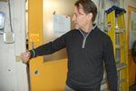 Coronavirus adaptation: Indow CEO Sam Pardue demonstrates how to pull the factory door open with an elbow. "We don’t want people using doorknobs anymore at all," he said. 